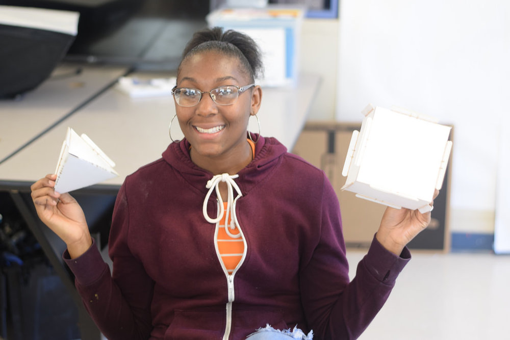 Student presenting her GeoConstructix project at MC2 in Cleveland, OH